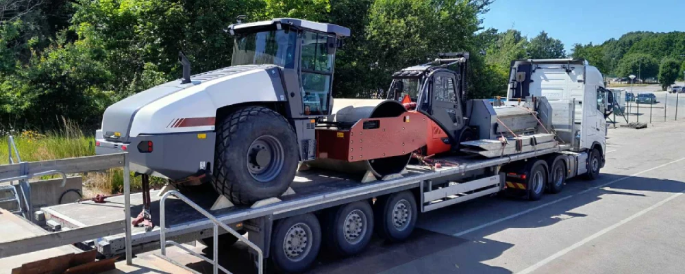 Road construction machinery delivery